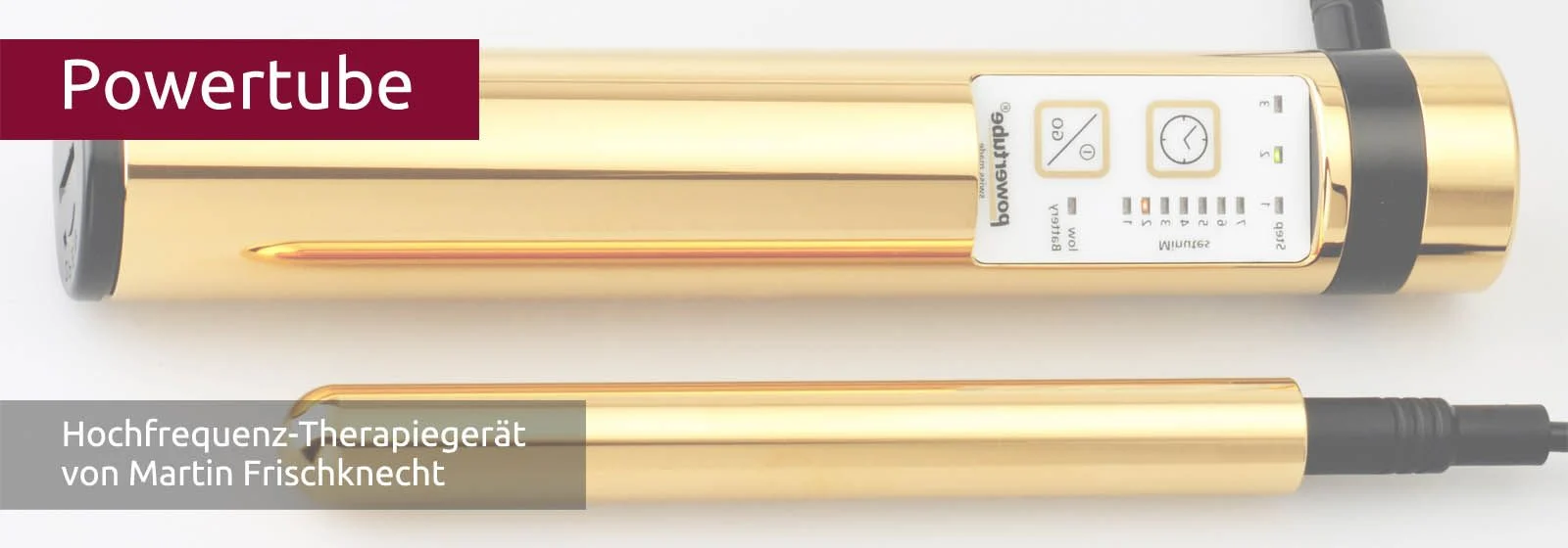 Zwei goldene Röhren liegen vor weissem Hintergrund horizontal da, eine ist dicker