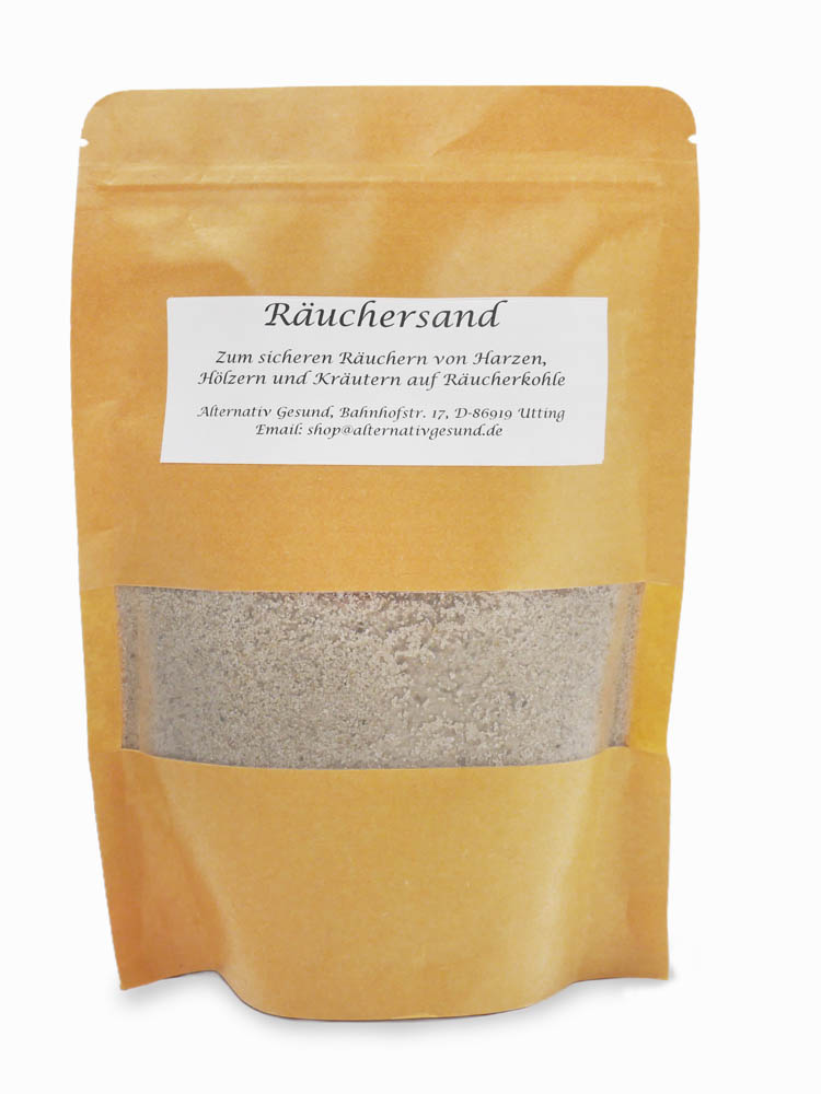 Eine beige-gelbe Papiertasche mit Sichtfenster, durch das man grauen Sand sieht